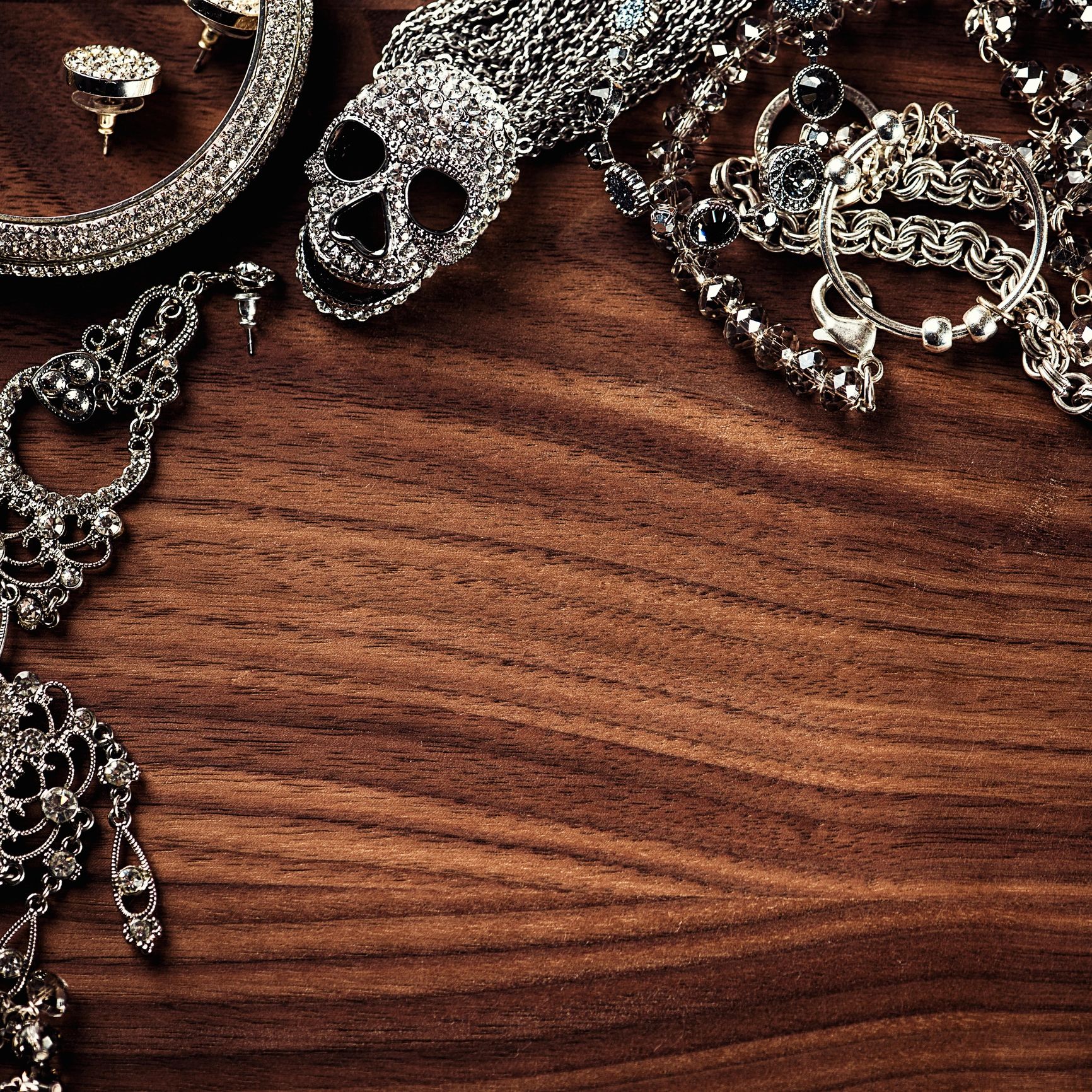 Decorative jewelry and accessories arranged as a background